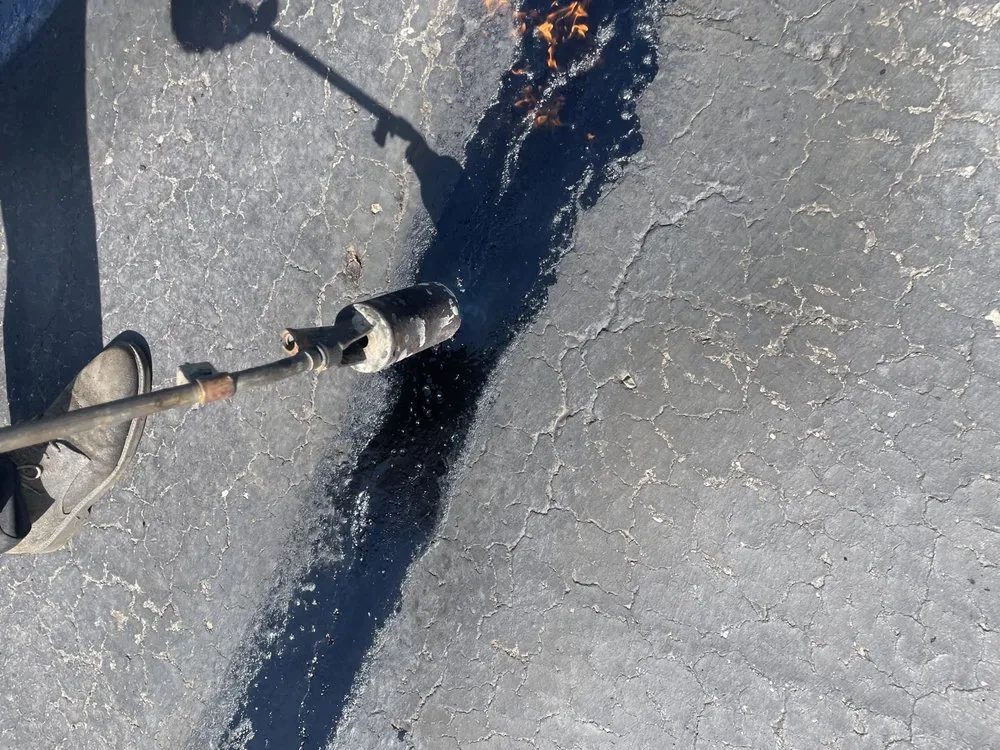 Slide of V&L Roofing Sealcoating Renovation