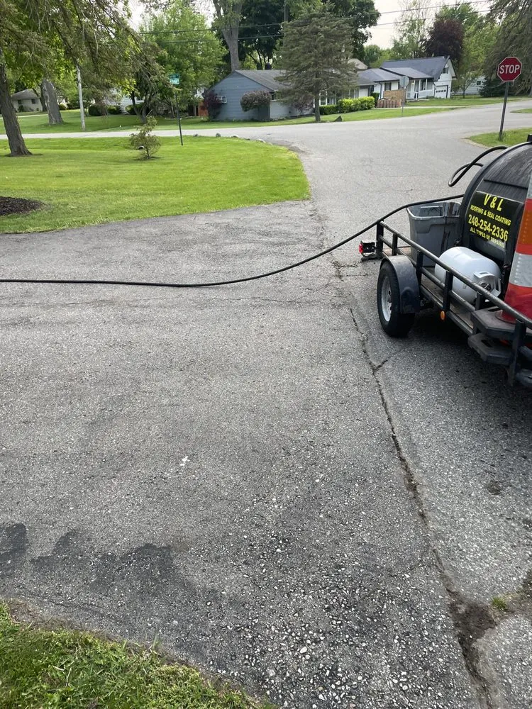 Slide of V&L Roofing Sealcoating Renovation