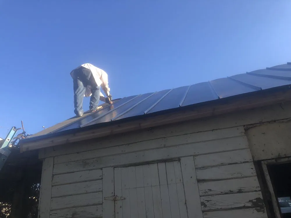 Slide of VNJ Roofers