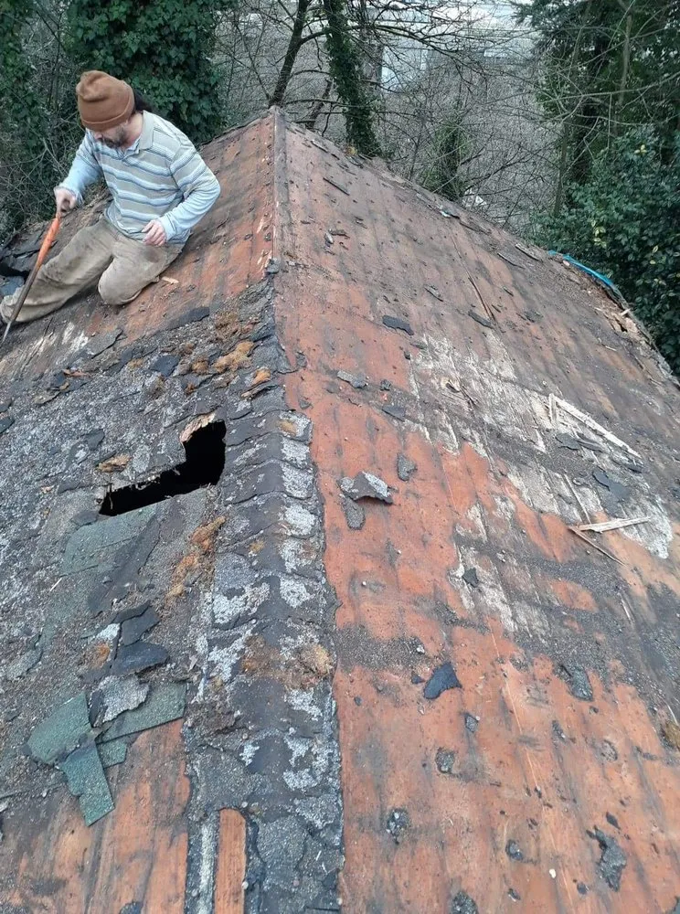 Slide of VNJ Roofers