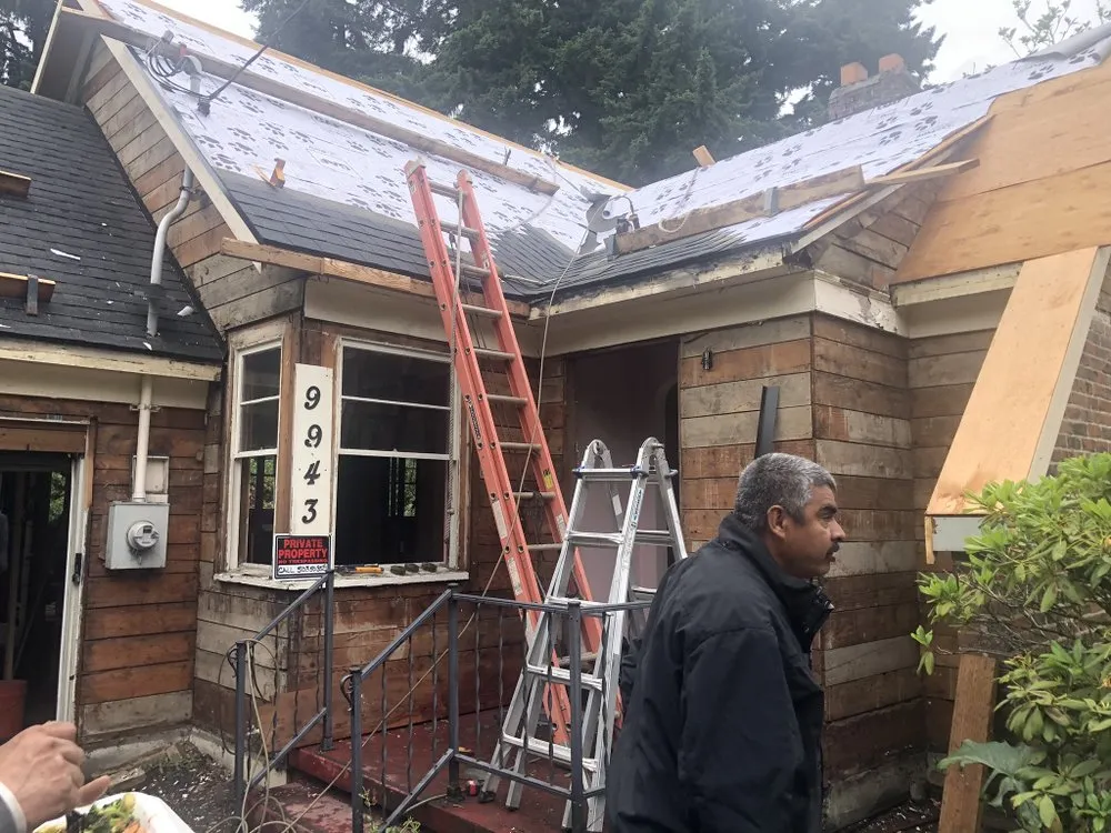 Slide of VNJ Roofers