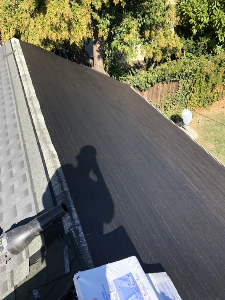 Slide of Volks Roofing