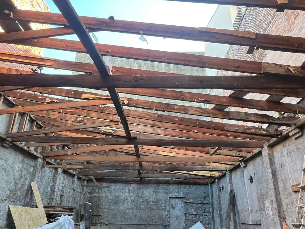 Slide of Voodoo Roofing