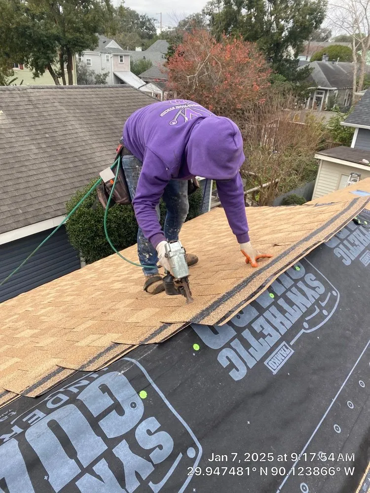 Slide of Voodoo Roofing