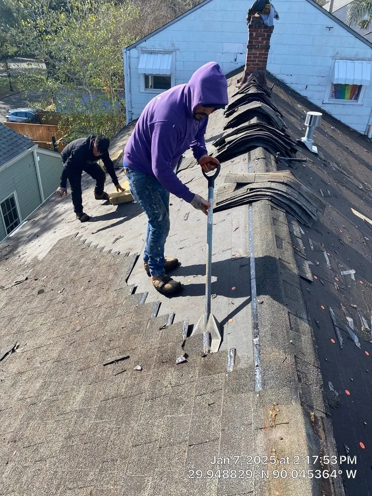 Slide of Voodoo Roofing