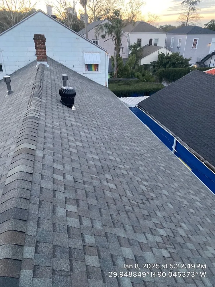 Slide of Voodoo Roofing