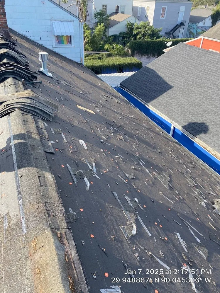 Slide of Voodoo Roofing