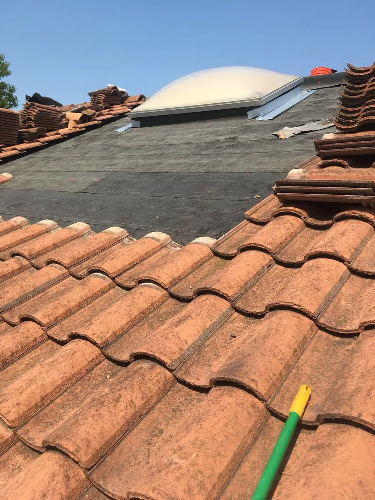 Slide of Vulcan Roofing Co