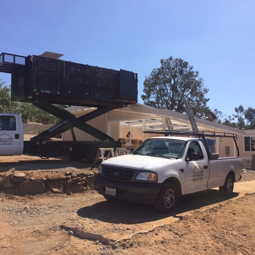 Slide of Vulcan Roofing Co