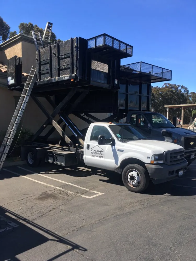 Slide of Vulcan Roofing Co