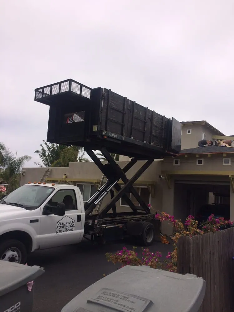 Slide of Vulcan Roofing Co