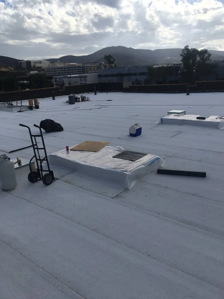 Slide of Vulcan Roofing Co