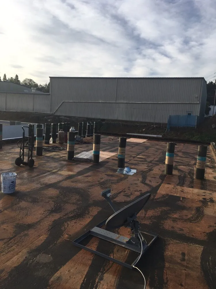 Slide of Vulcan Roofing Co