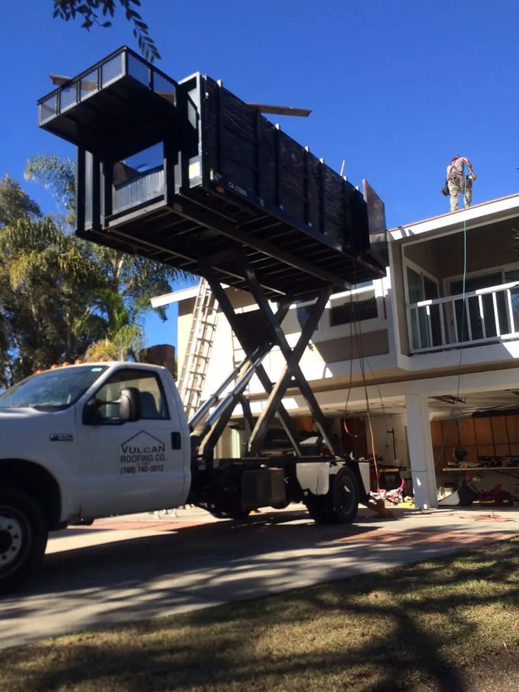 Slide of Vulcan Roofing Co