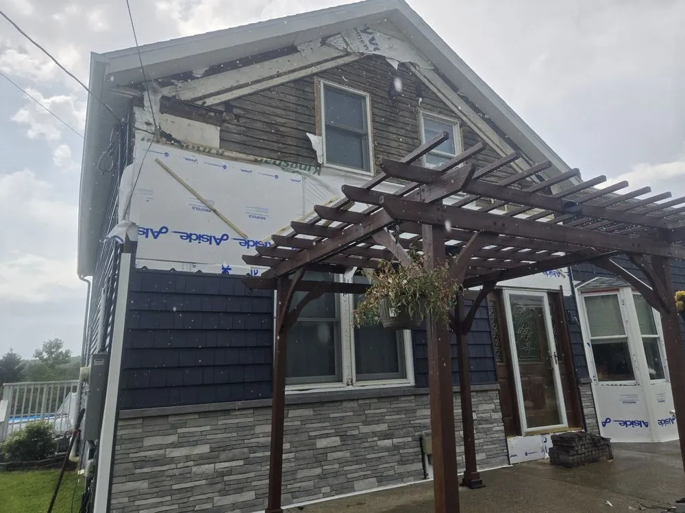 Slide of VVS Exteriors