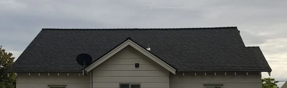 Slide of VW Quality Roofing