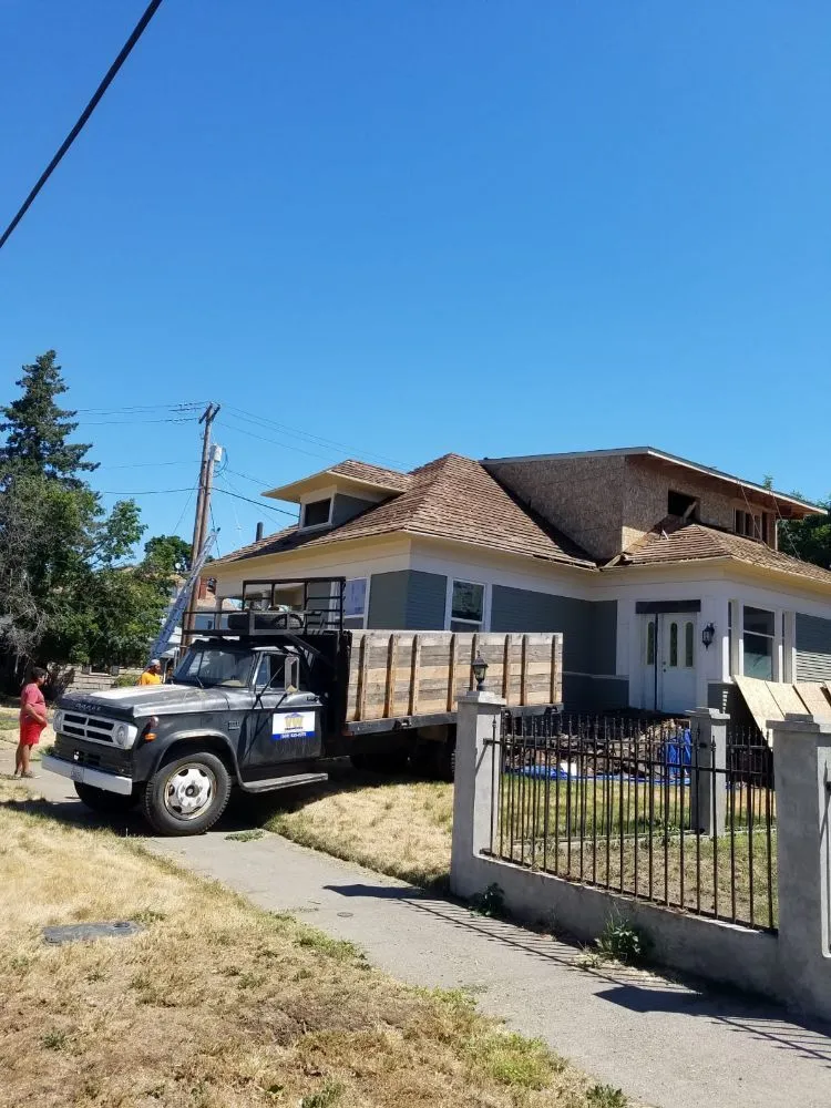 Slide of VW Quality Roofing