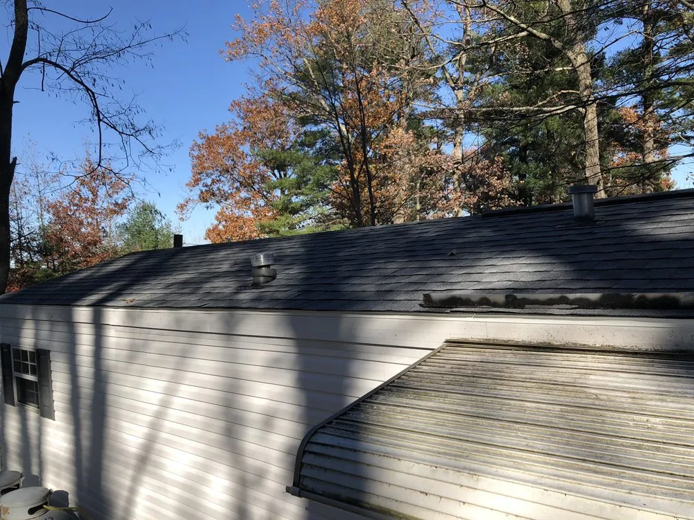 Slide of W Ticos Roofing