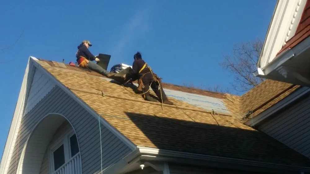 Slide of W Ticos Roofing