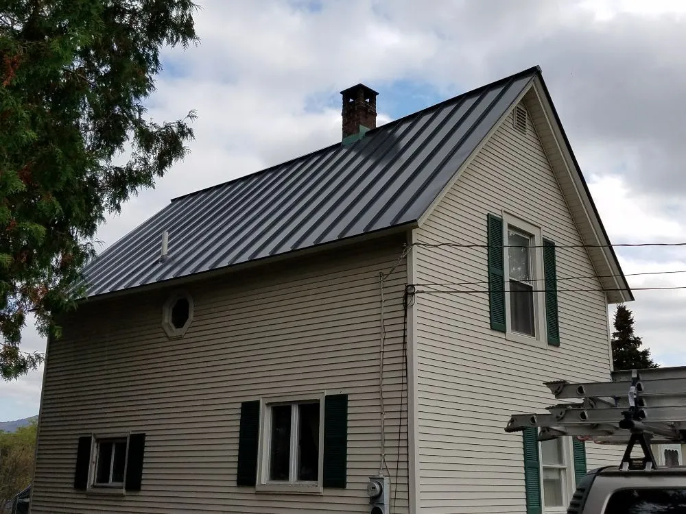 Slide of W Ticos Roofing