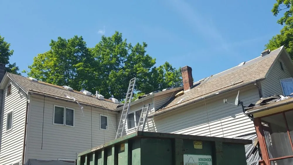 Slide of W Ticos Roofing