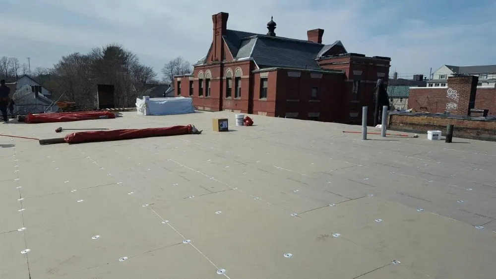 Slide of W Ticos Roofing