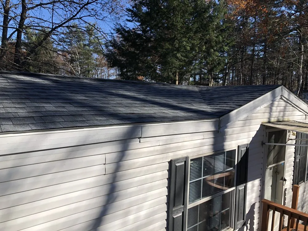 Slide of W Ticos Roofing