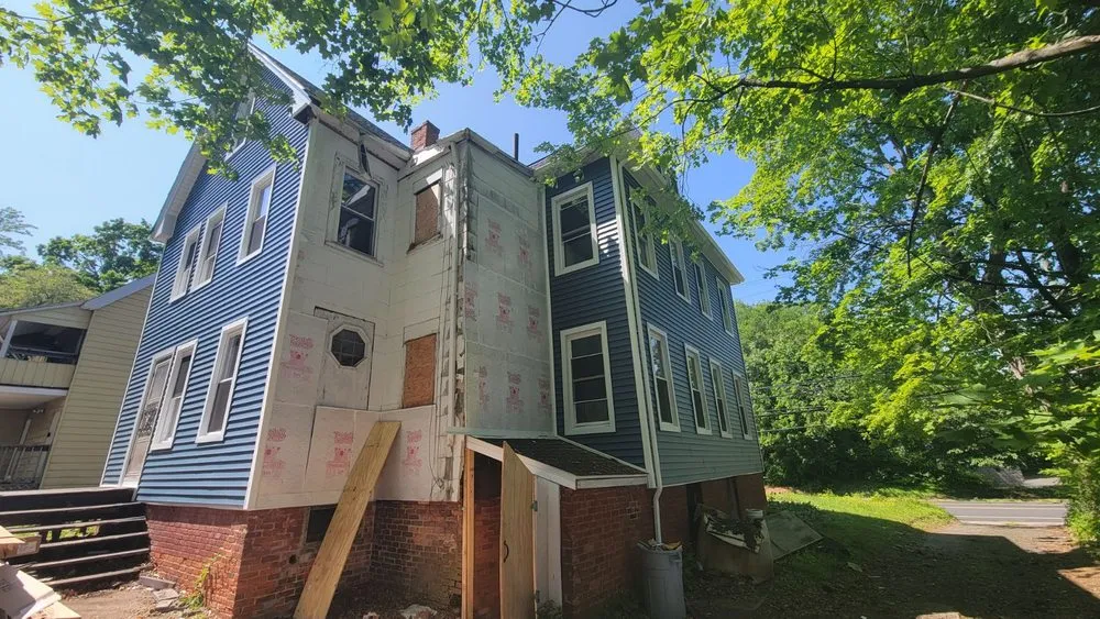 Slide of WA Roofing Services