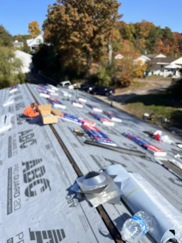 Slide of WA Roofing Services