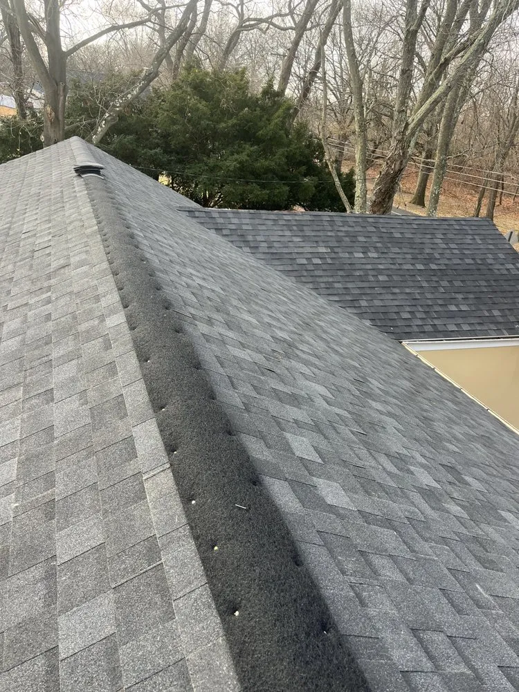 Slide of WA Roofing Services