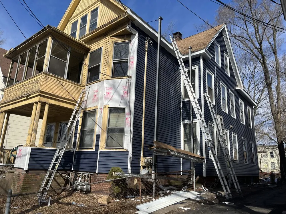 Slide of WA Roofing Services