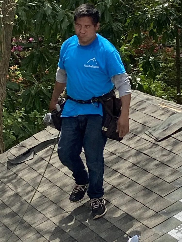 Slide of Wake Roofing