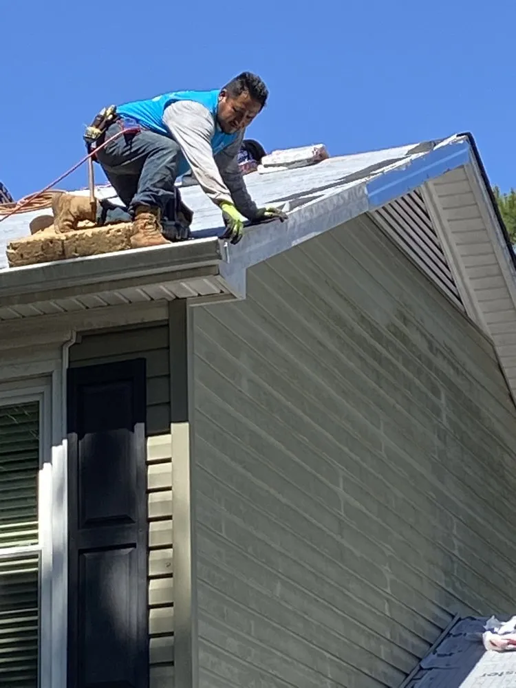 Slide of Wake Roofing