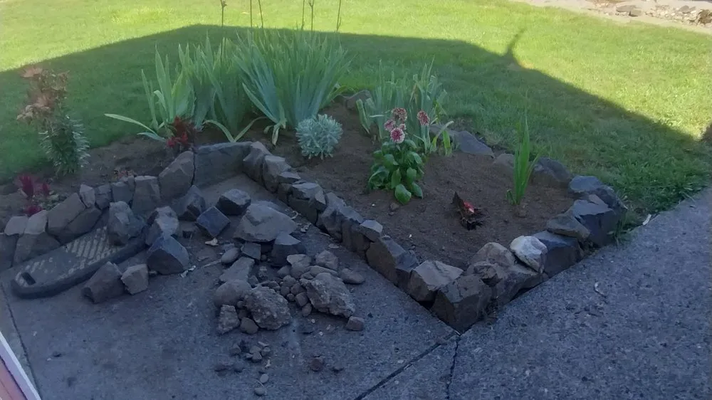 Slide of Waldo's Yard and Home Improvements