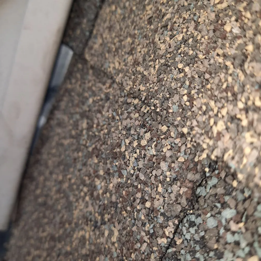 Slide of Walker Roofing