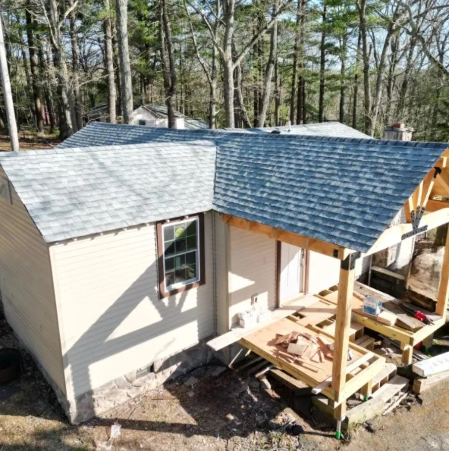 Licensed flat roof repair after storm damage in Greentown, PA by Wallenpaupack Roofers