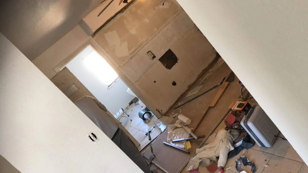 Slide of Walsh’s Tree’s & Concrete Roofing Home Remodelers