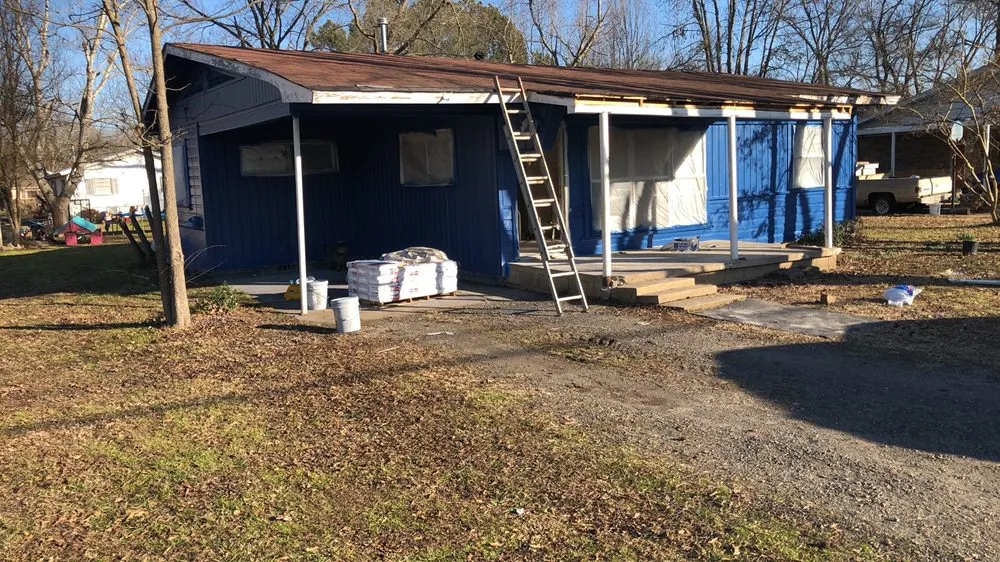 Slide of Walsh’s Tree’s & Concrete Roofing Home Remodelers