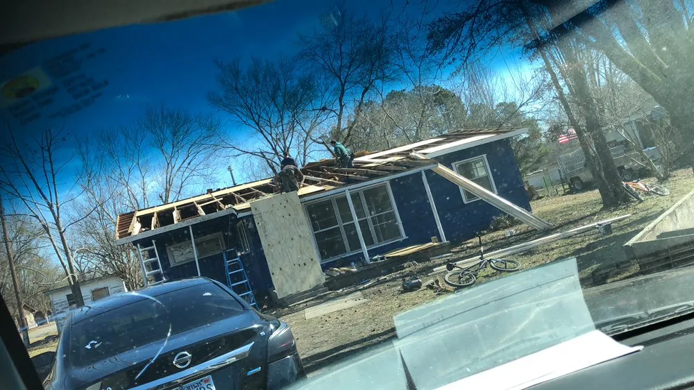 Slide of Walsh’s Tree’s & Concrete Roofing Home Remodelers