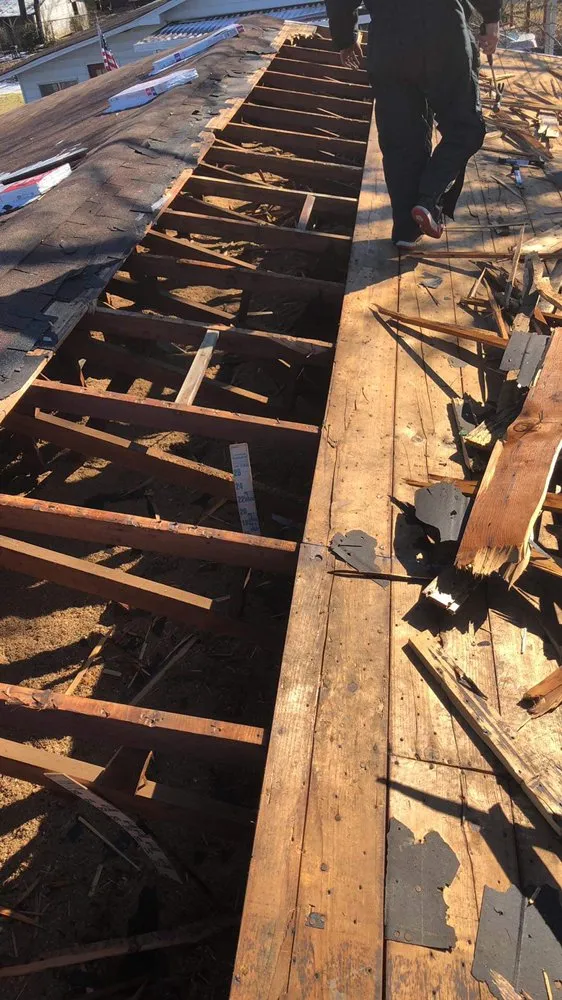 Slide of Walsh’s Tree’s & Concrete Roofing Home Remodelers