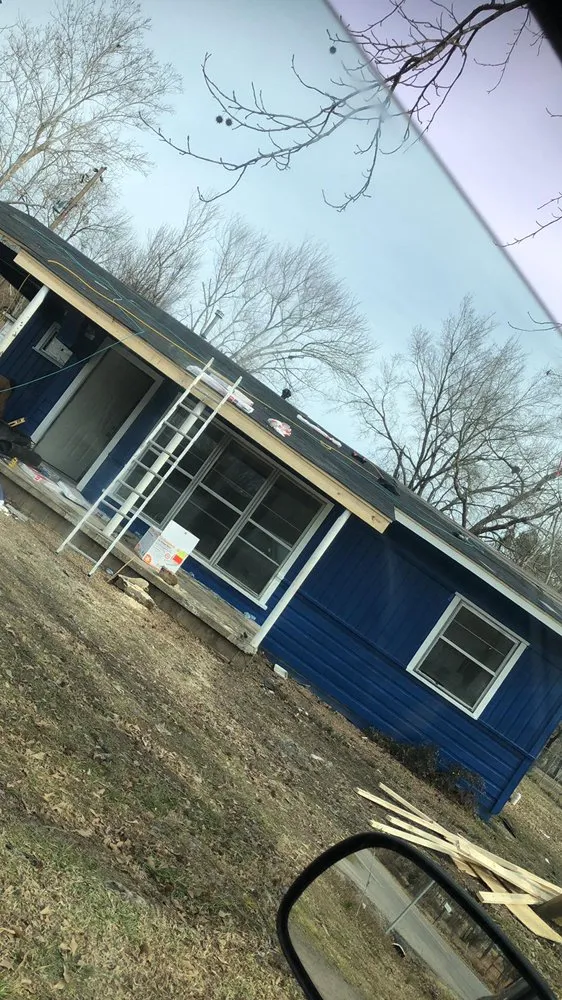 Slide of Walsh’s Tree’s & Concrete Roofing Home Remodelers