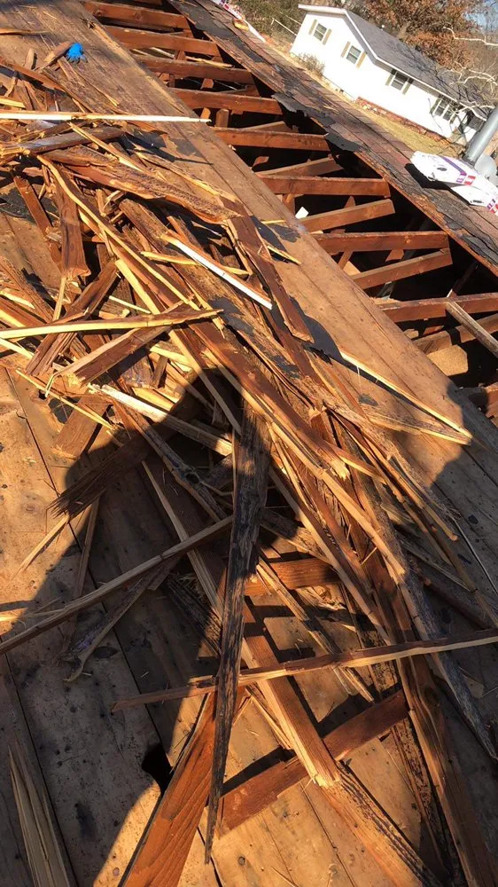 Slide of Walsh’s Tree’s & Concrete Roofing Home Remodelers