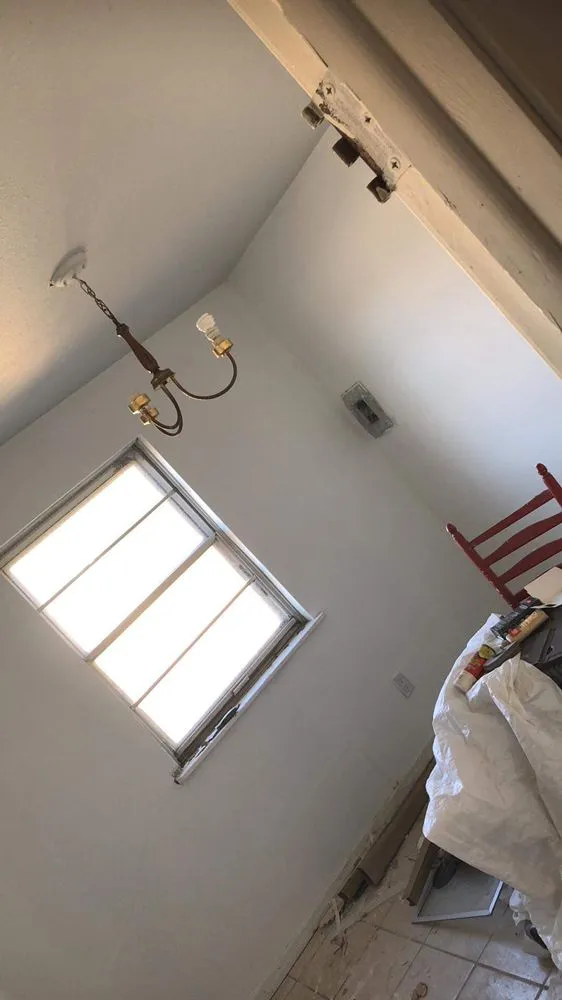 Slide of Walsh’s Tree’s & Concrete Roofing Home Remodelers