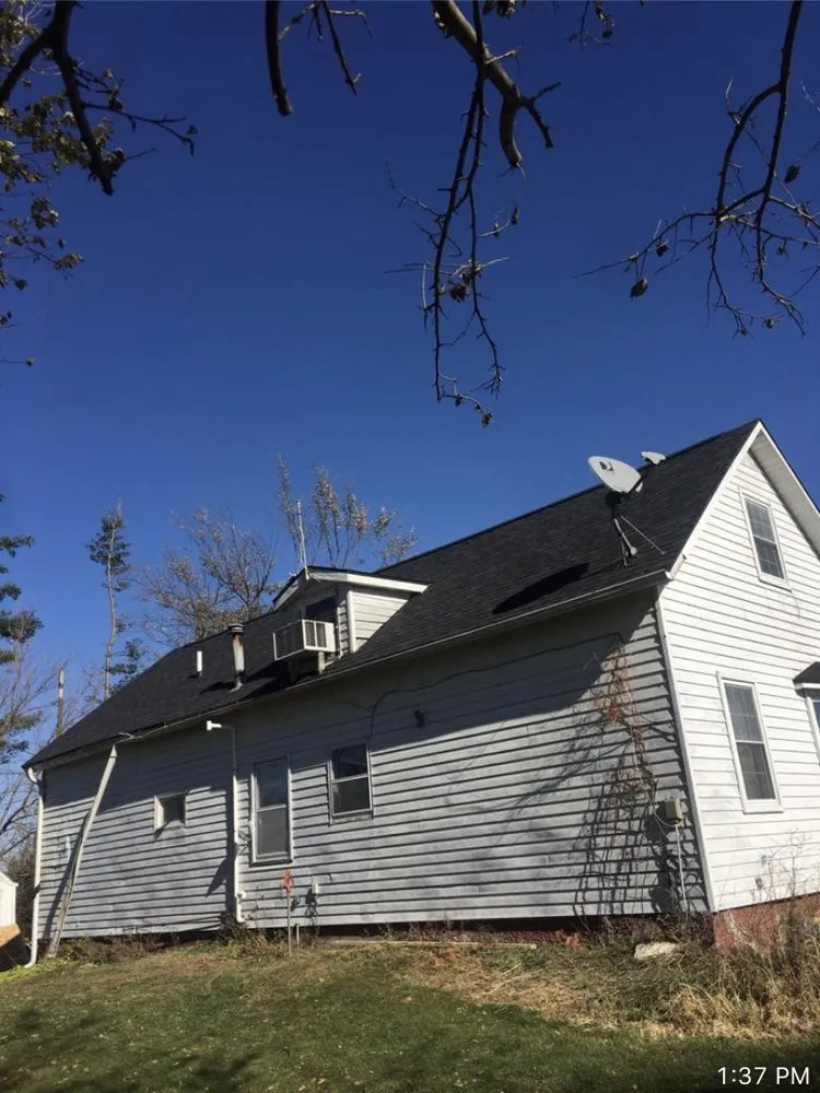 Slide of Walter Roofing