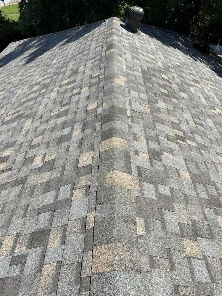 Slide of Warhurst Roofing