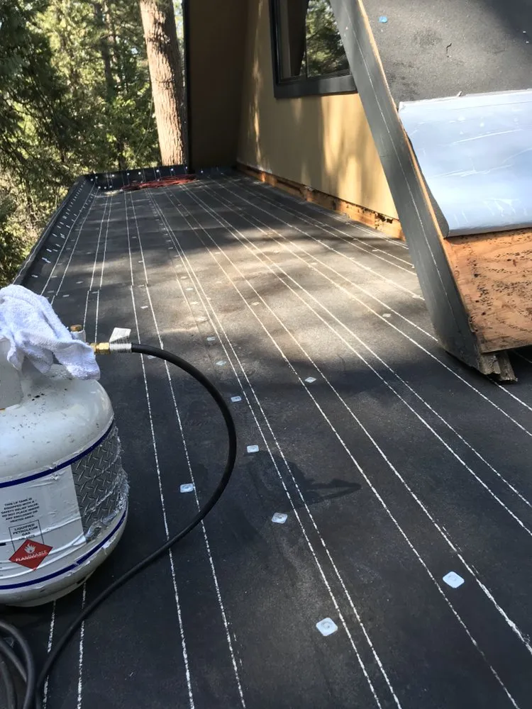 Slide of Warren Roofing