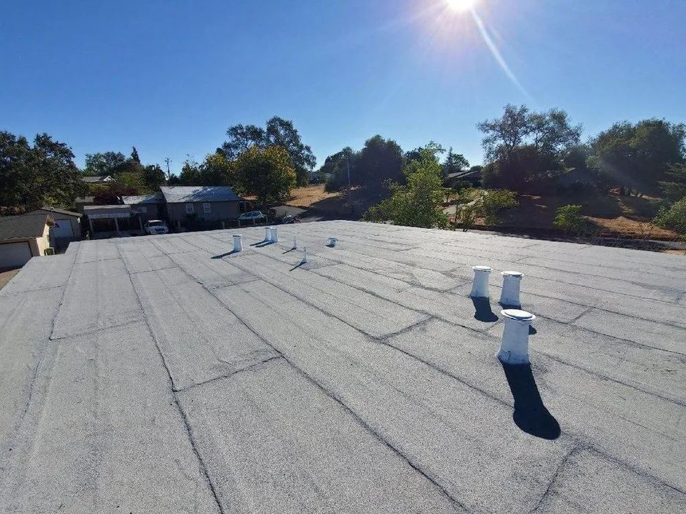 Slide of Warren Roofing