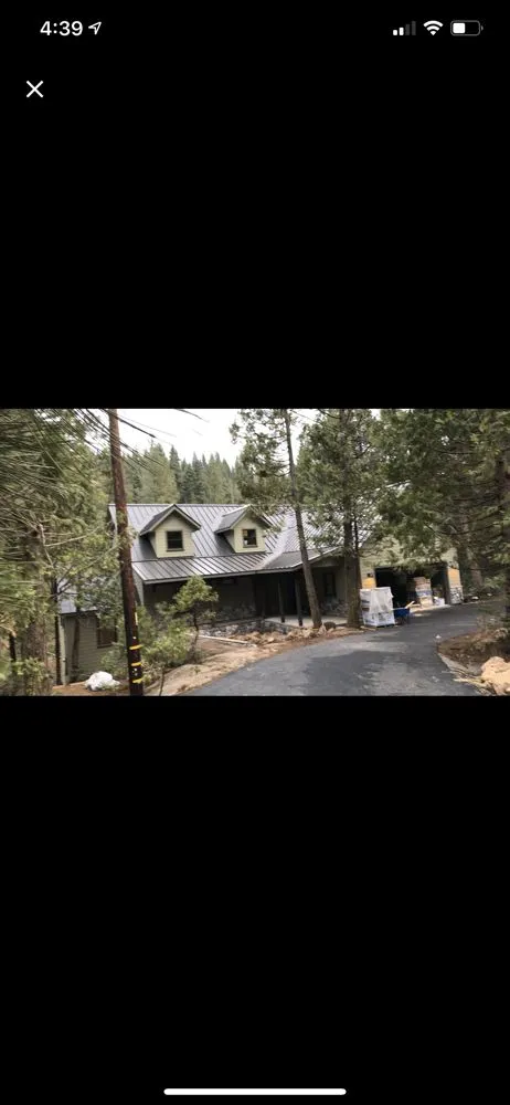 Slide of Warren Roofing