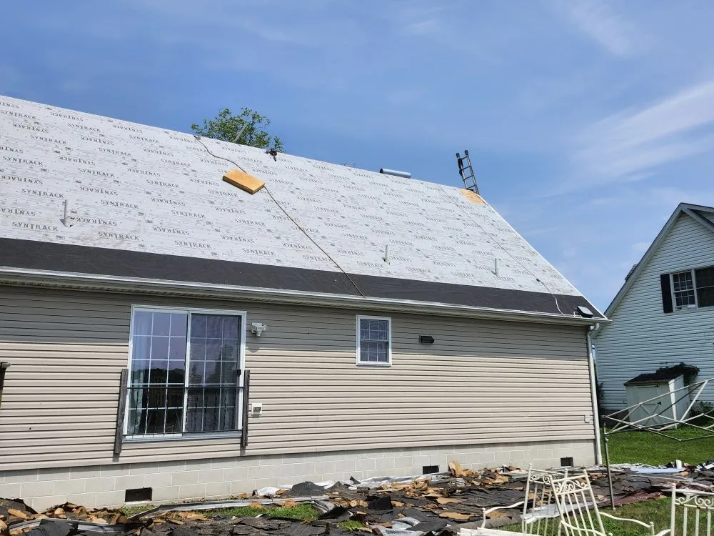 Slide of Warrior Roofing & Siding