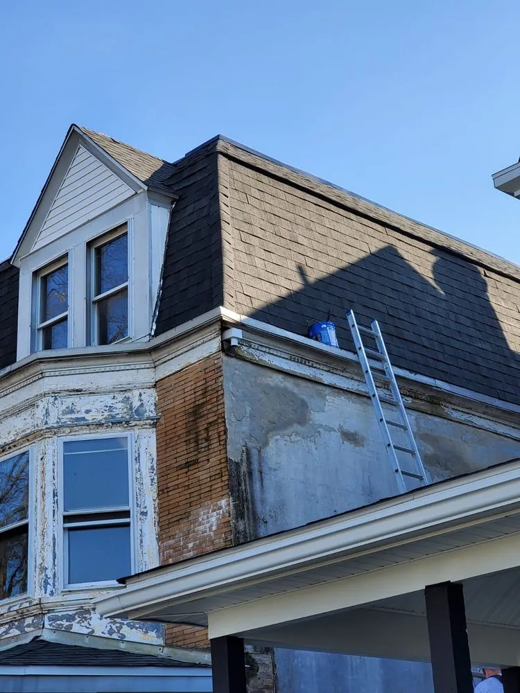 Slide of Warrior Roofing & Siding